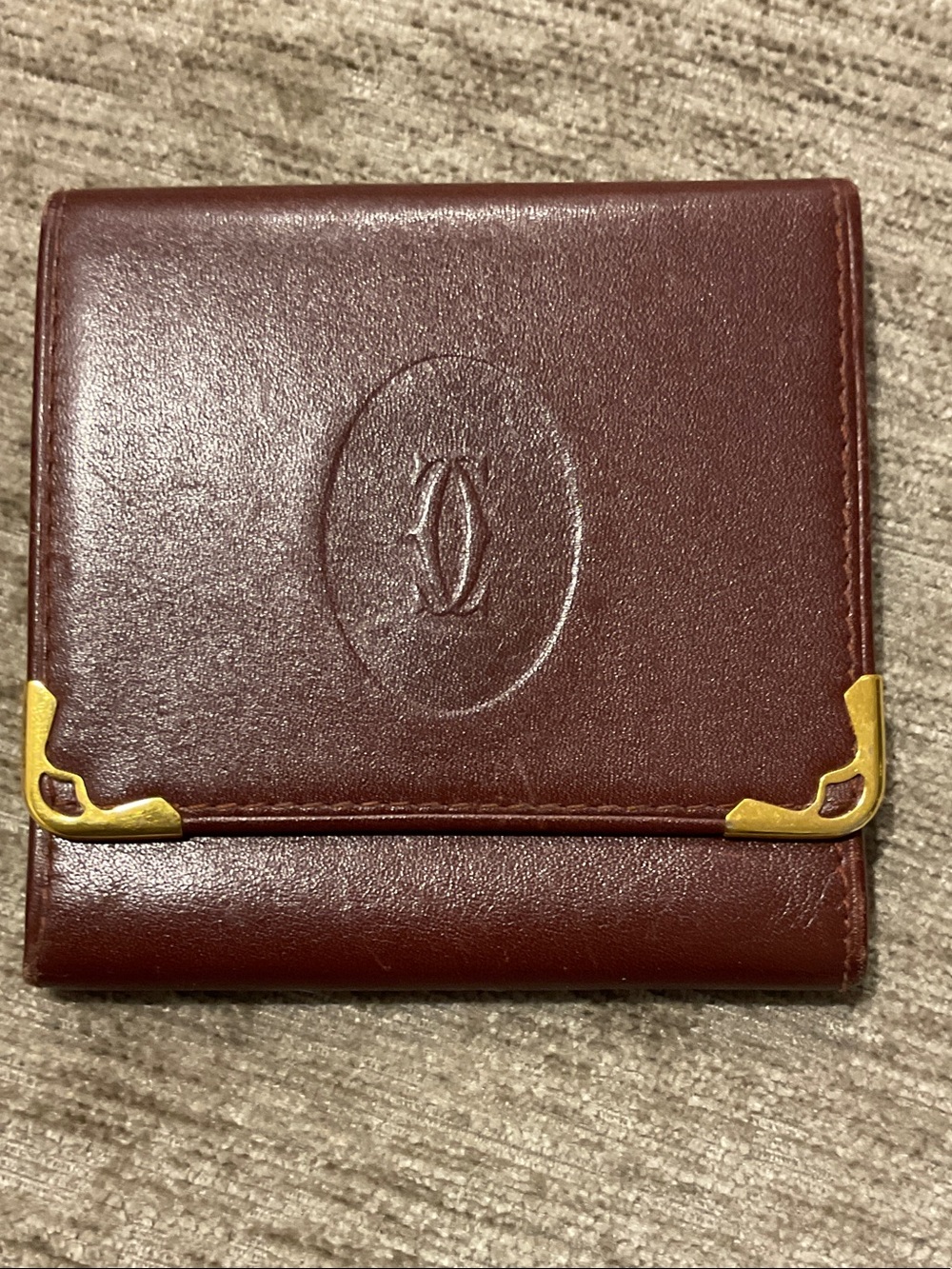 Vintage Must de Cartier bordeaux leather coin purse, gold-tone corner hardware